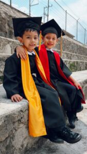 two kids with toga